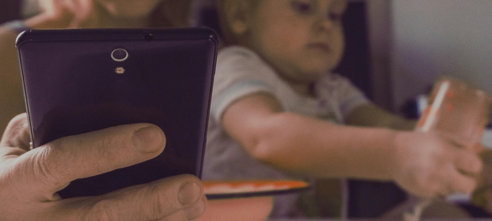 Mother on phone with child