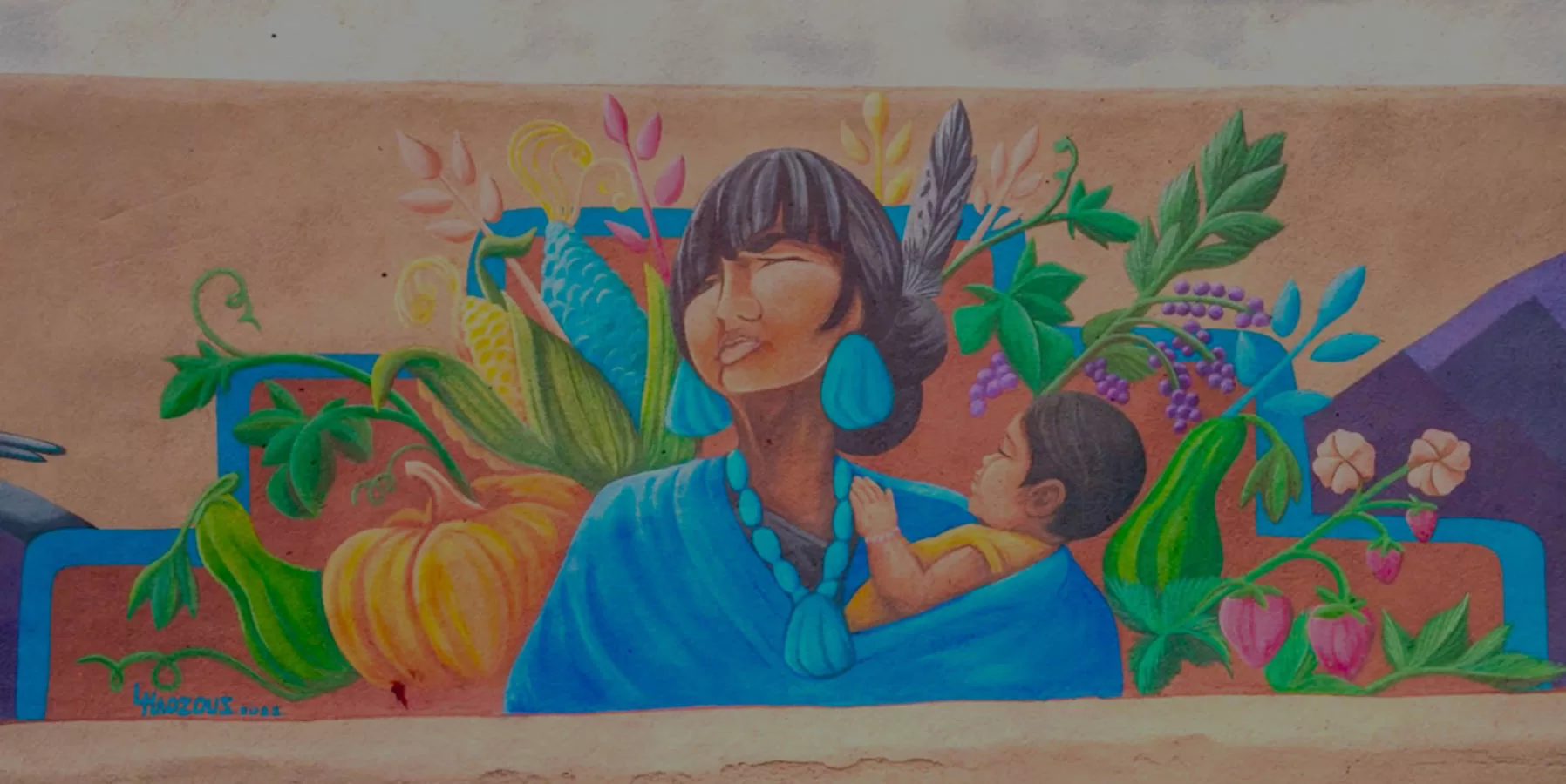 Mural of indigenous woman and child in Taos, NM